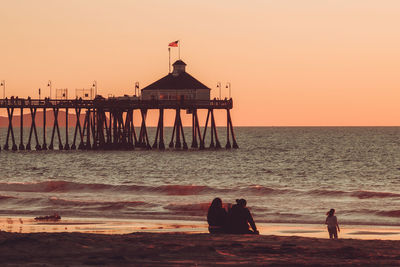 People watching the sunset in imperial beach, california.