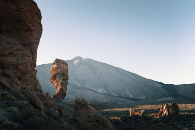 Scenic view of mountains against clear sky