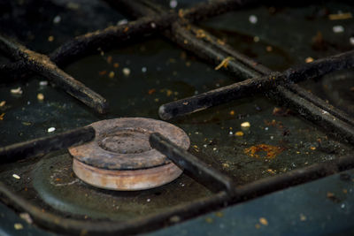 High angle view of rusty metal chain