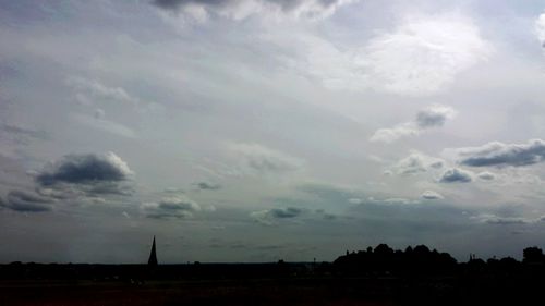Silhouette trees against sky