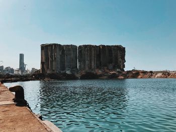 View of sea with buildings in background