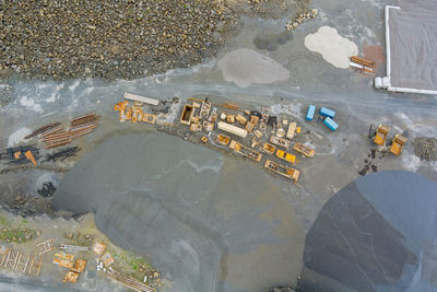 High angle view of reflection of puddle in water