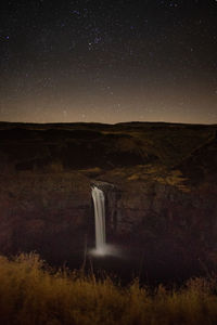 High angle view of waterfall at night