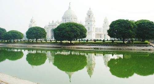 Reflection of building in pond