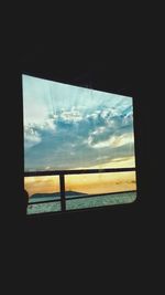 Scenic view of sea seen through window