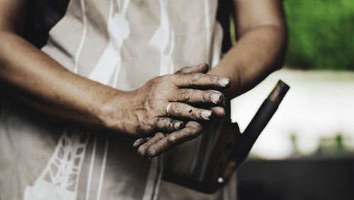 Hand of a man after take care of his garden.image of dirty hands .chill out time while gardening