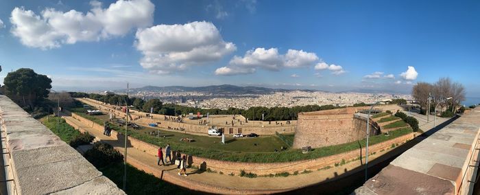 Panoramic view of town against sky
