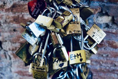 Close-up of padlocks hanging on metal