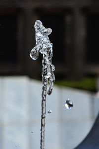 Close-up of water drop on fountain