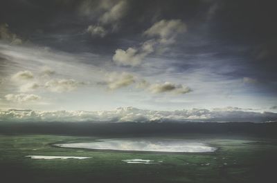 View of hot spring against sky