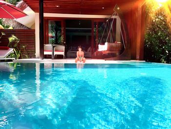 Woman swimming in pool