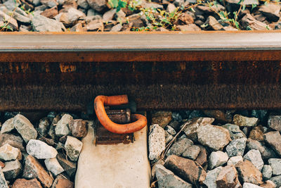 High angle view of stones on railroad track