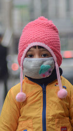 Portrait of boy wearing mask.