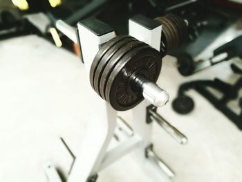 High angle view of dumbbells in gym