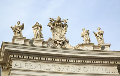 Low angle view of statue against sky