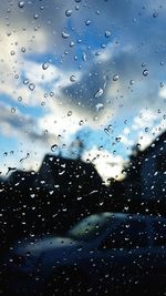 Full frame shot of raindrops on window