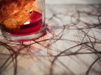 Close-up of glass on table