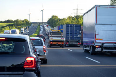 Rescue lane, cars and trucks during traffic jam in the evening, germany