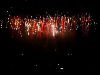 Firework display at night