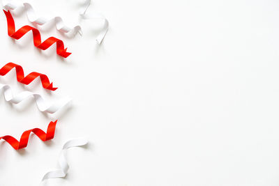 High angle view of heart shape on white table