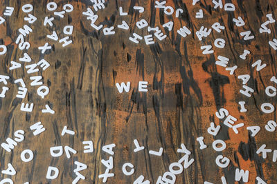 High angle view of text on wood