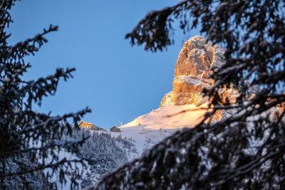 Low angle view of rock formation against sky