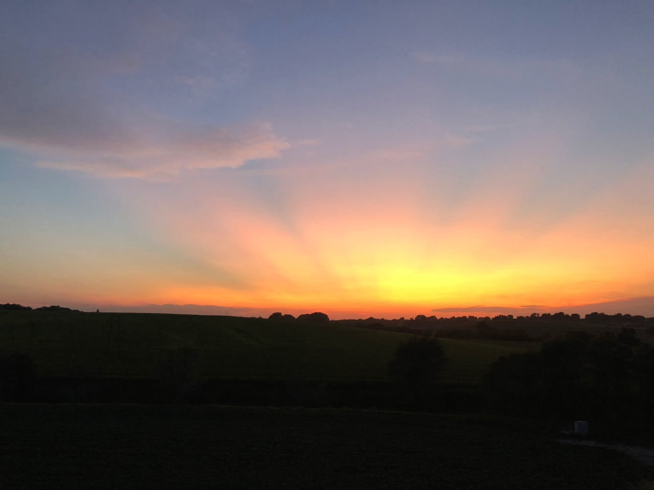 sky, sunset, scenics - nature, beauty in nature, landscape, cloud, environment, tranquility, tranquil scene, nature, afterglow, silhouette, orange color, horizon, no people, land, idyllic, dawn, outdoors, red sky at morning, non-urban scene, plant, dramatic sky, field, sun, evening, sunlight, tree, plain