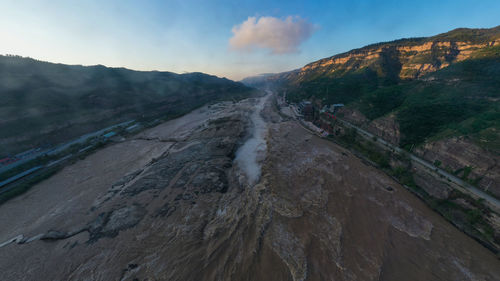 Panoramic view of mountains against sky