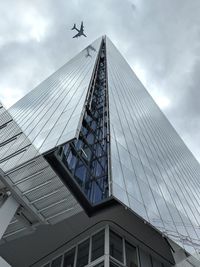 Low angle view of modern building against sky