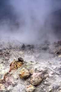 Steam over rock formations