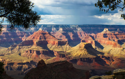 Scenic view of landscape against cloudy sky