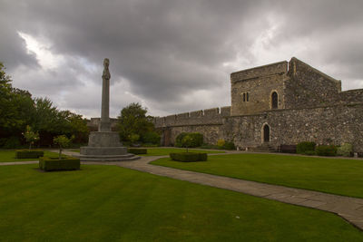 View of historical building against cloudy sky