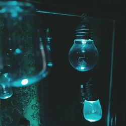 Close-up of illuminated light bulb