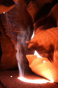 Close-up of fire on rock