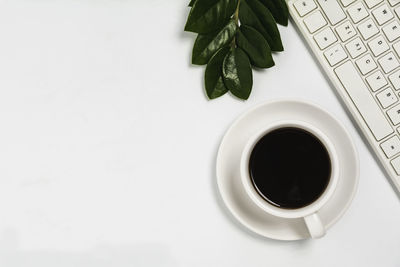 Directly above shot of coffee cup on table