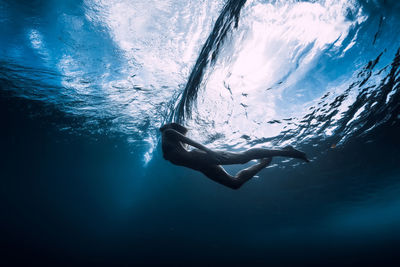 Man swimming in sea