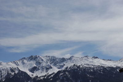 Idyllic shot of snowcapped mountains against sky