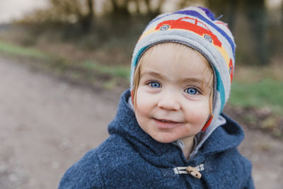 Portrait of cute boy in snow