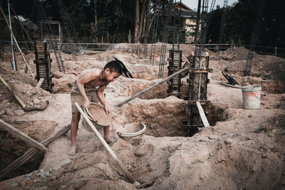 Side view of a man working