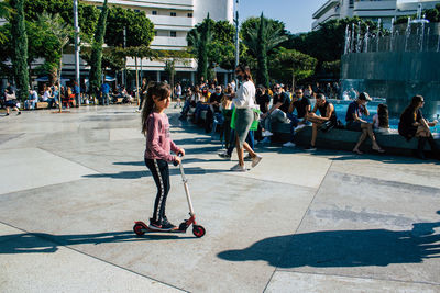 People on zebra crossing in city