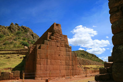 Old ruins of temple against blue sky