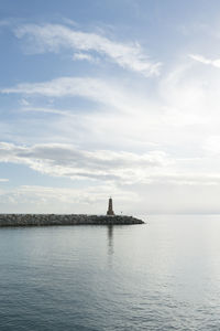 View of sea against cloudy sky