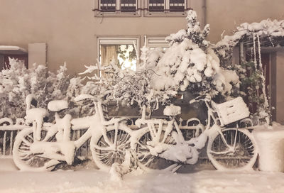 Close-up of snow on bicycle during winter