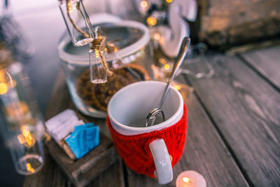 High angle view of tea light candles on table