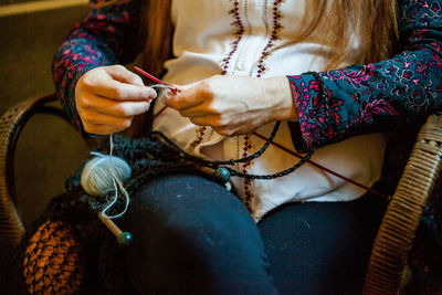 Close-up of woman knitting