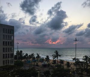 Scenic view of beach against sky during sunset