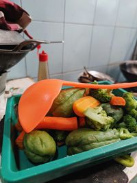 High angle view of fruits and vegetables in kitchen