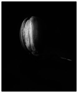 Close-up of bread over black background