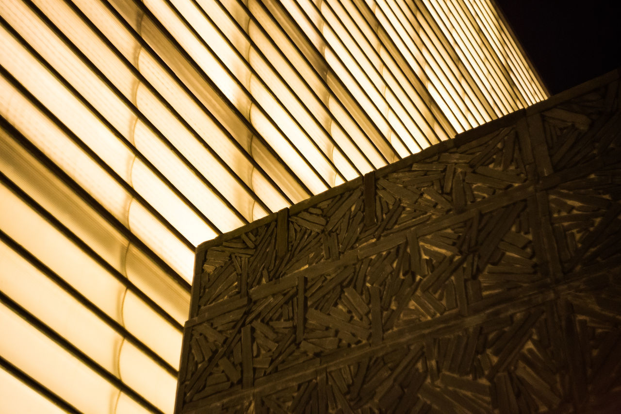 LOW ANGLE VIEW OF BUILDING SEEN THROUGH WINDOW