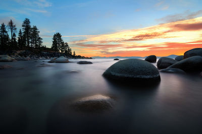 Scenic view of sea against sky during sunset